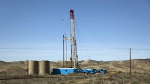 Drill rig and storage tanks Rangely Colorado