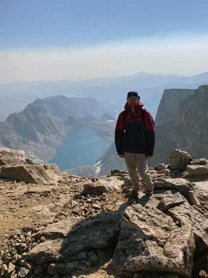 Kevin Ward standing on Cloud Peak in Bighorn Mountains in Wyoming