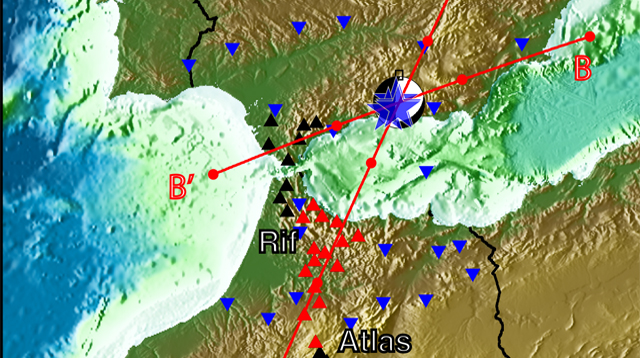 Map of seismic stations and the deep Granada earthquake. Red triangles indicate stations for studying the low velocity layer on the slab.