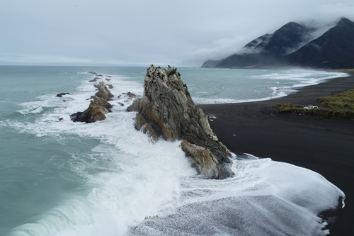 Ewe Fault (EF2) in southeastern North Island of New Zealand. The fault is uplifting the tilted limestone in the photo.