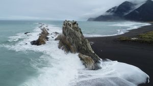 Ewe Fault (EF2) in southeastern North Island of New Zealand. The fault is uplifting the tilted limestone in the photo.