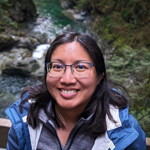 Andrea Llenos headshot in field