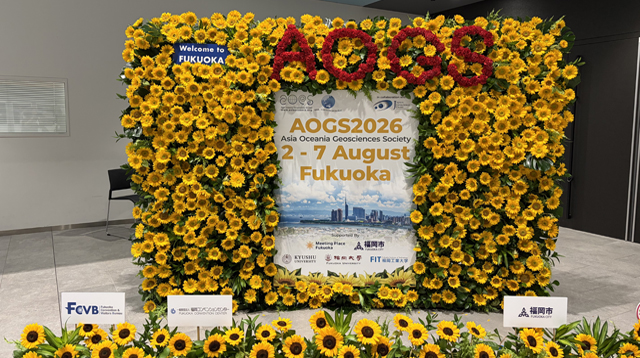 AOGS 2026 welcome sign surrounded by sunflowers
